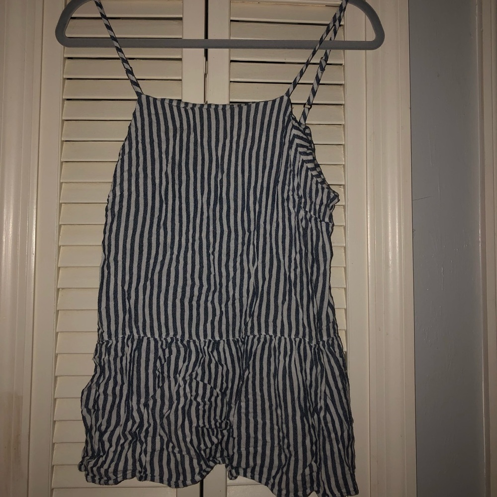 A high to low flowing tank top